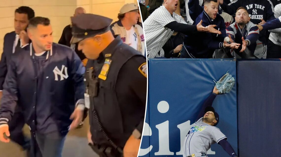 Aficionado de los Yankees es escoltado fuera de Yankee Stadium tras interferir en la jugada de Anthony Volpe