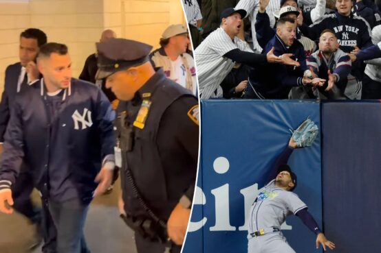 Aficionado de los Yankees es escoltado fuera de Yankee Stadium tras interferir en la jugada de Anthony Volpe